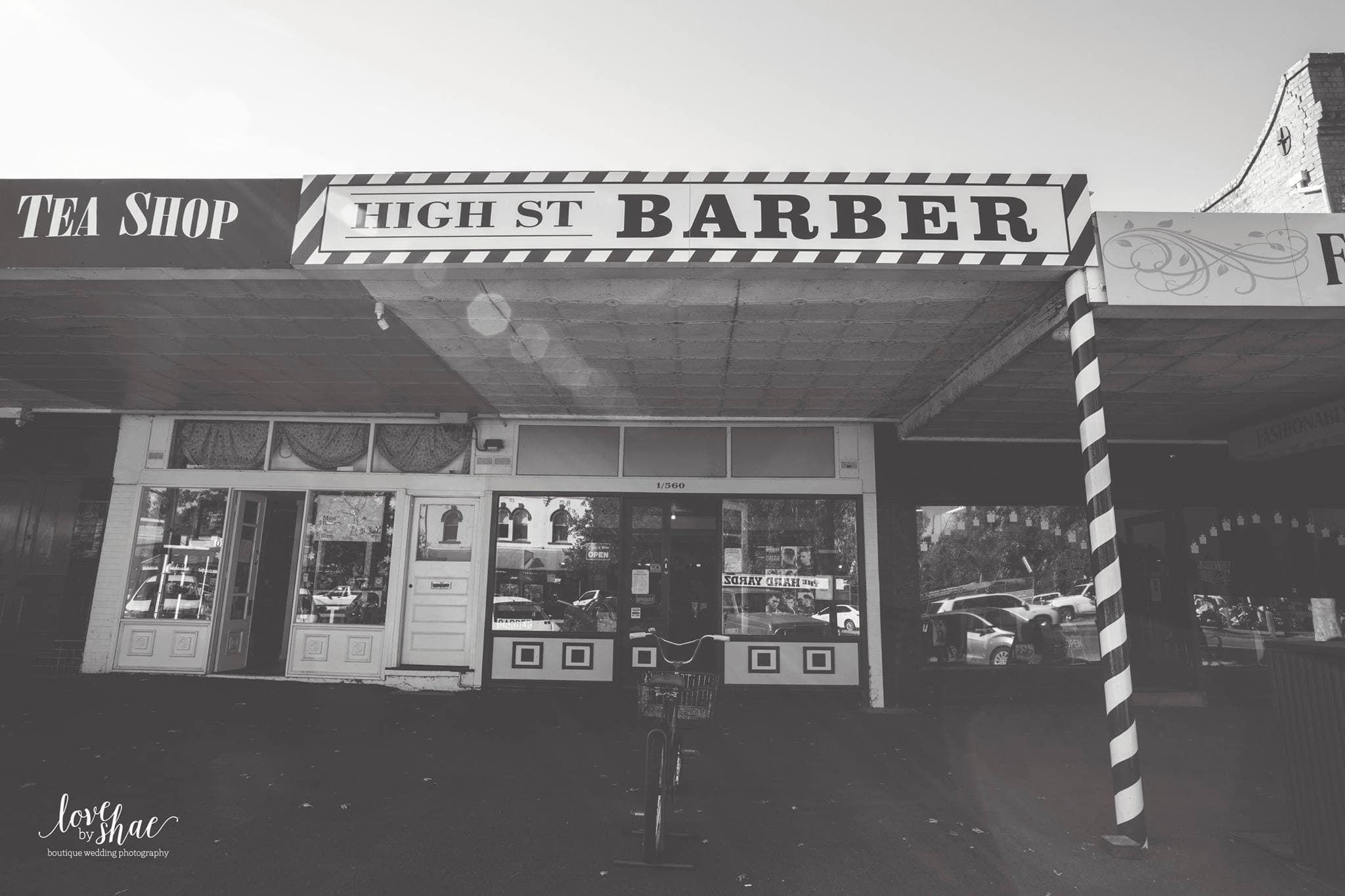 High St Barber storefront in Echuca, vintage black and white
